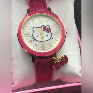 Hello Kitty pink strap gold trim pink charm watch with hello kitty logo face‎